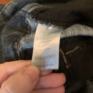 Maurice’s jeans that are missing a button.